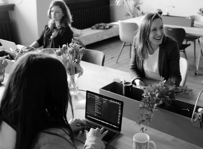 team of people working on computers